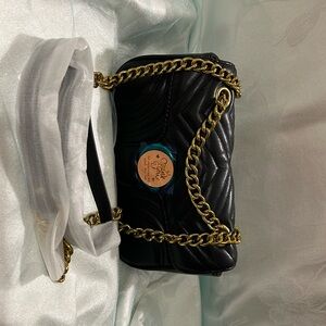 She’s so cute small crossbody brand new……….you G-otta have her